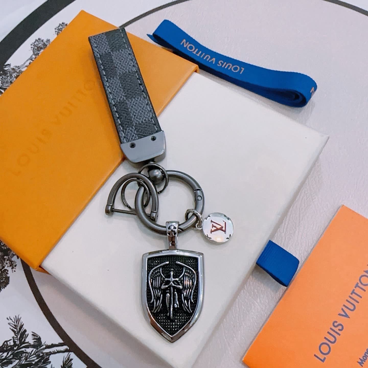 Louis Vuitton Keychain with Shield and Leather Strap